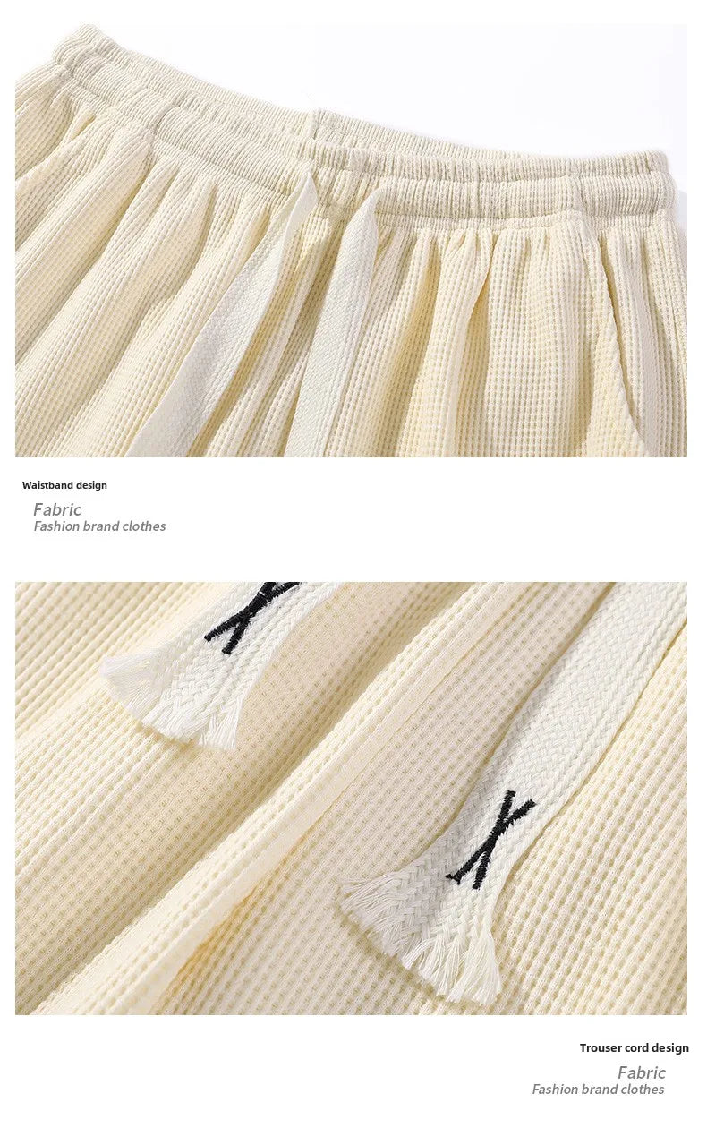 Sports shorts for men in summer  thin ice silk quick drying five quarter pants  fashionable waffle style drawstring shorts