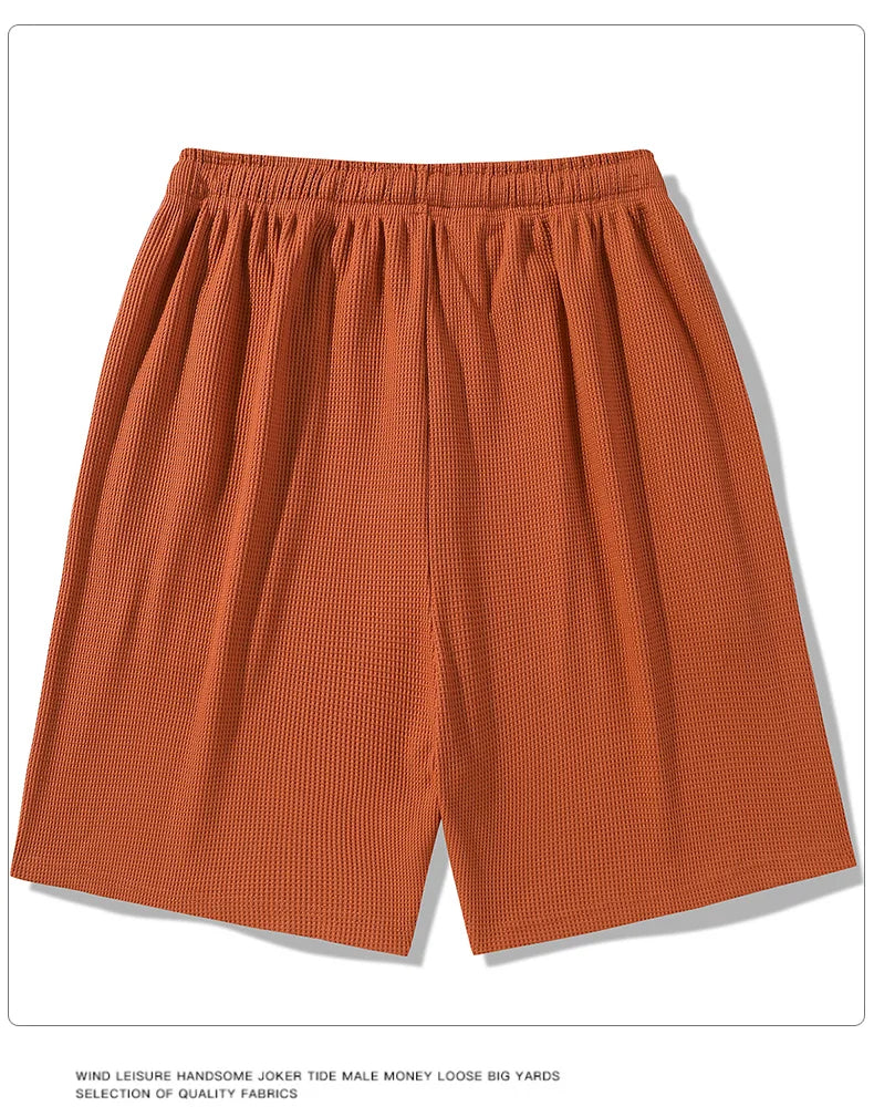 Sports shorts for men in summer  thin ice silk quick drying five quarter pants  fashionable waffle style drawstring shorts