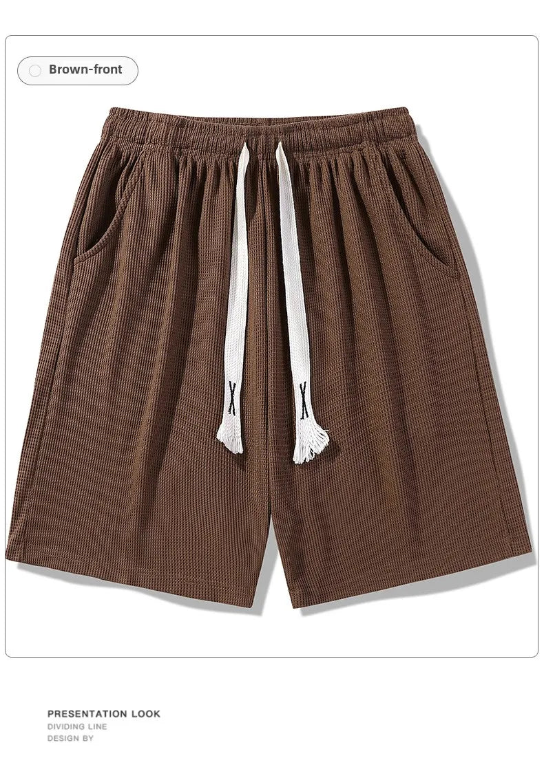 Sports shorts for men in summer  thin ice silk quick drying five quarter pants  fashionable waffle style drawstring shorts
