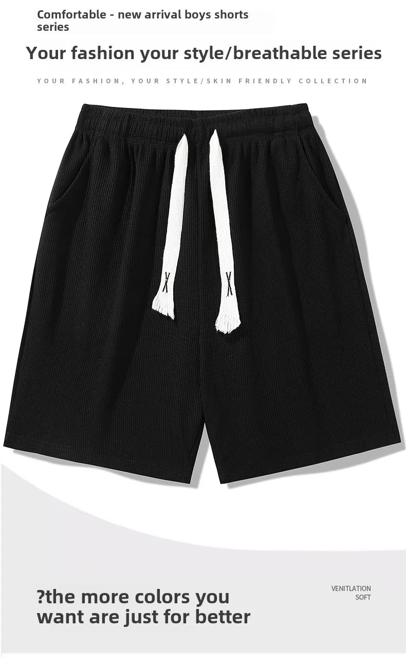 Sports shorts for men in summer  thin ice silk quick drying five quarter pants  fashionable waffle style drawstring shorts