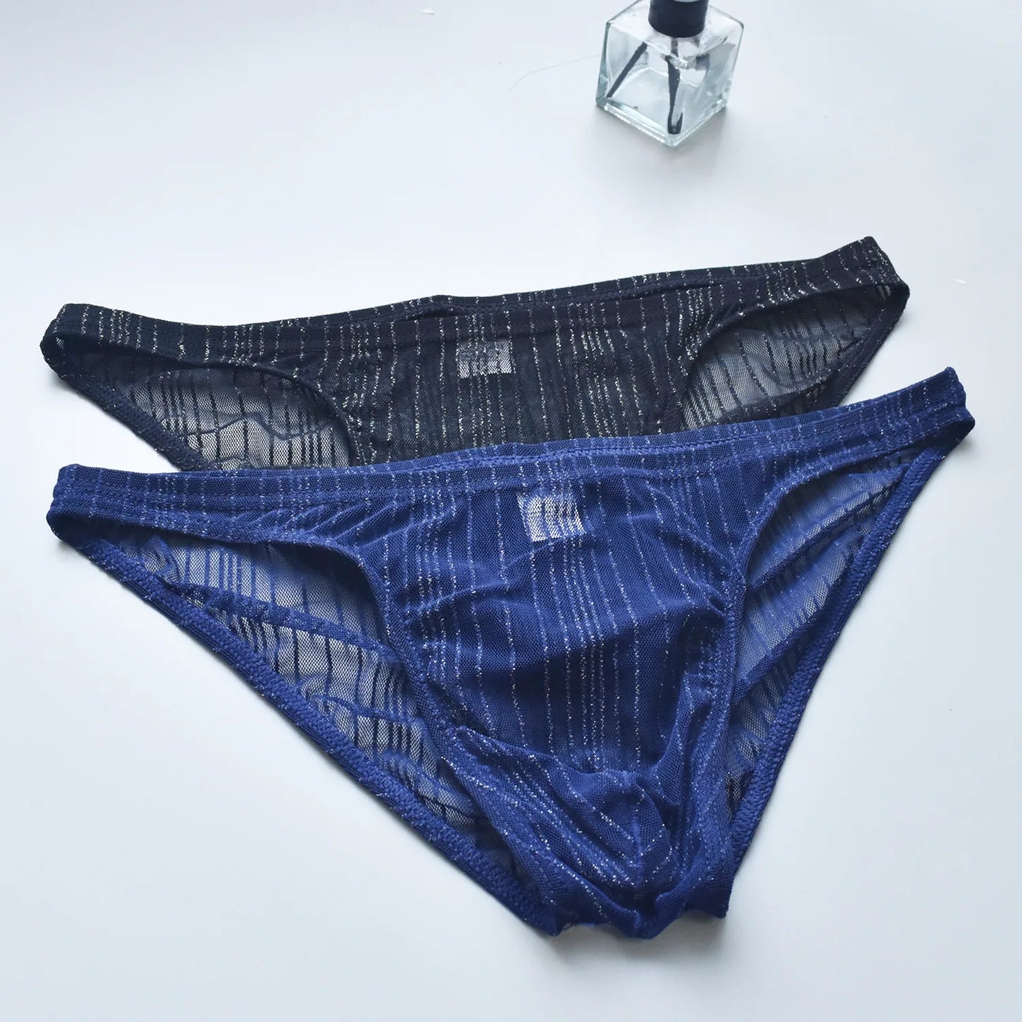 Men's sexy underwear, transparent and fun mesh thin transparent quick drying triangle pants, low waist breathable underwear