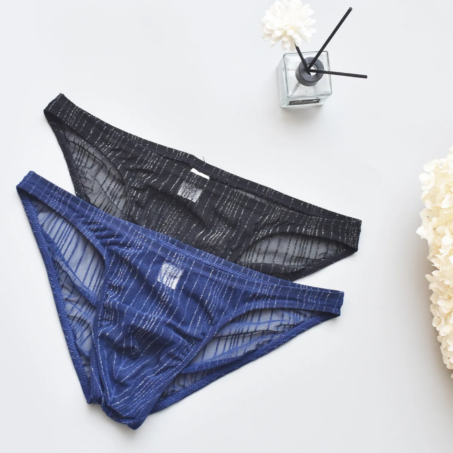 Men's sexy underwear, transparent and fun mesh thin transparent quick drying triangle pants, low waist breathable underwear