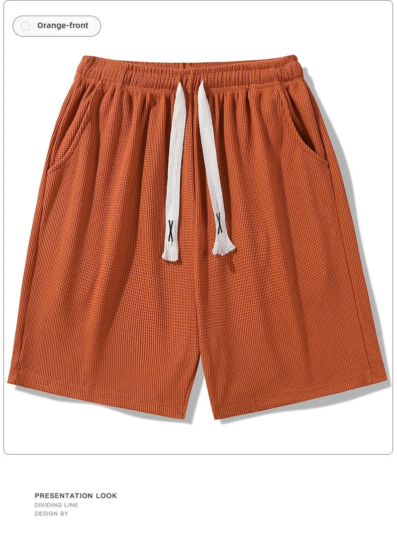 Sports shorts for men in summer  thin ice silk quick drying five quarter pants  fashionable waffle style drawstring shorts