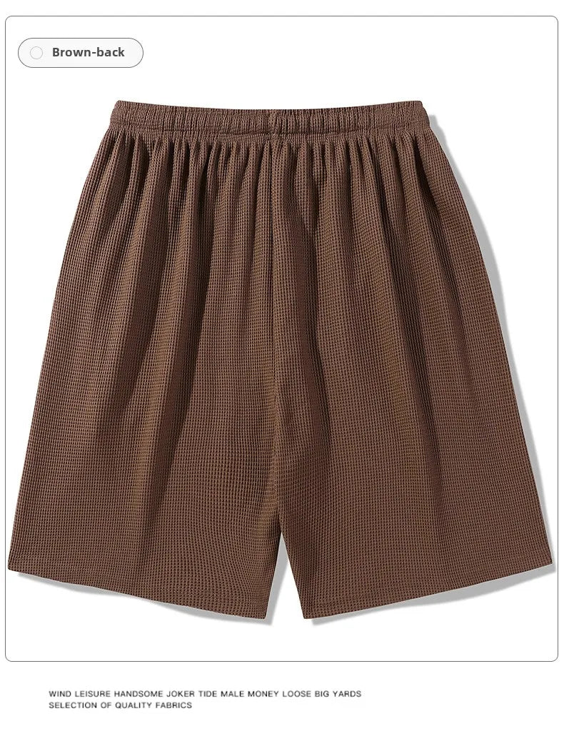 Sports shorts for men in summer  thin ice silk quick drying five quarter pants  fashionable waffle style drawstring shorts