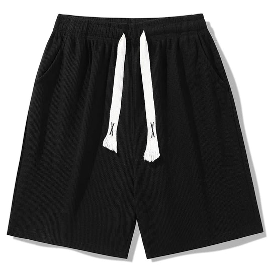 Sports shorts for men in summer  thin ice silk quick drying five quarter pants  fashionable waffle style drawstring shorts