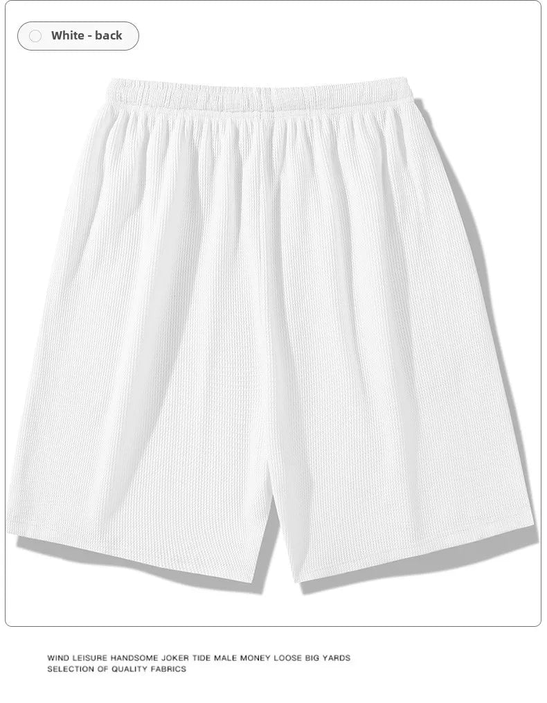 Sports shorts for men in summer  thin ice silk quick drying five quarter pants  fashionable waffle style drawstring shorts