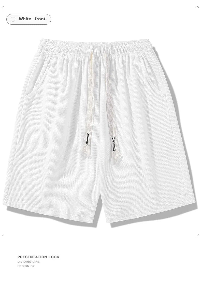 Sports shorts for men in summer  thin ice silk quick drying five quarter pants  fashionable waffle style drawstring shorts
